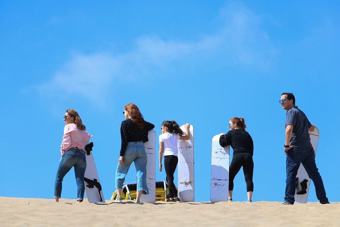 2D/1N Private Tour: Ballestas, Paracas, Vineyard & Huacachina - Huacachina dunes at sunset: buggy rides and sandboarding reality check