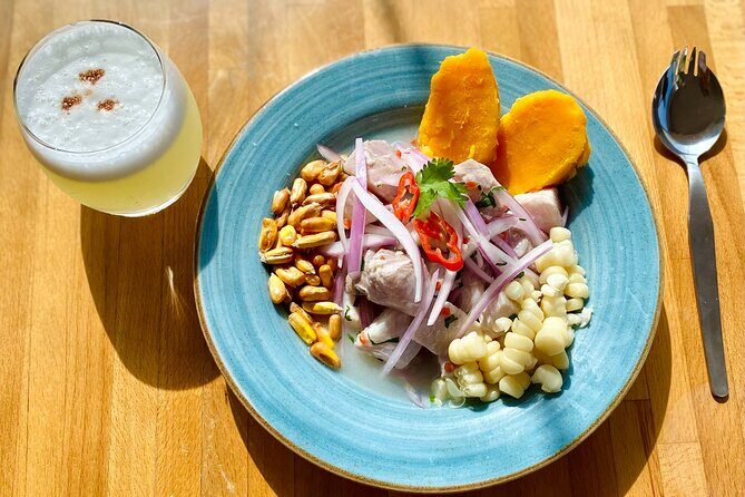 Best Cooking Classes and Local Market Visit in Miraflores - Tasting your ceviche and pisco sour with a city view