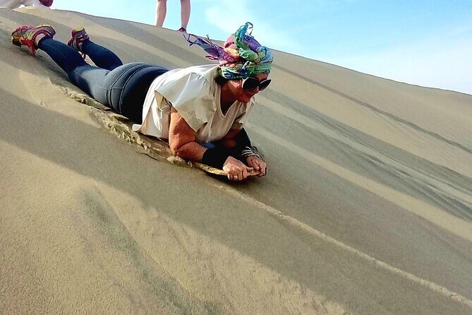 Day Tour to Ballestas Islands and Huacachinca Ica Desert - Huacachina Oasis: lagoon views and the dune-cart/sandboarding option