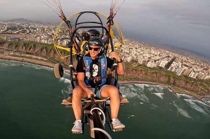 Fly paragliding along the coast of Lima - Coastal Paragliding Over Lima: The Big Picture