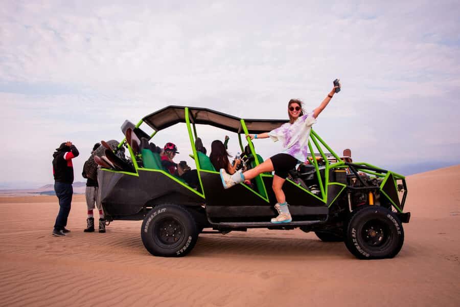 From Lima: Full Day to Paracas and Huacachina Desert Oasis - Huacachina Oasis walk: the calm break between the action