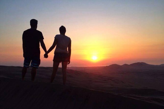 Full day tour sandboarding in Huacachina from Lima - Lie-down sandboarding: how you learn fast on the dunes