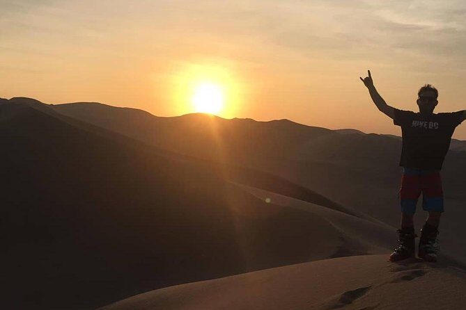 Full day tour sandboarding in Huacachina from Lima - Huacachina oasis time: palms, lagoon views, and why this place is different