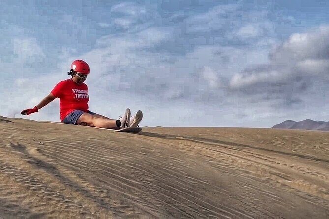 Lima: Sand-sledding OFF ROAD Half Day!! - The included gear setup: helmet, gloves, glasses, and board
