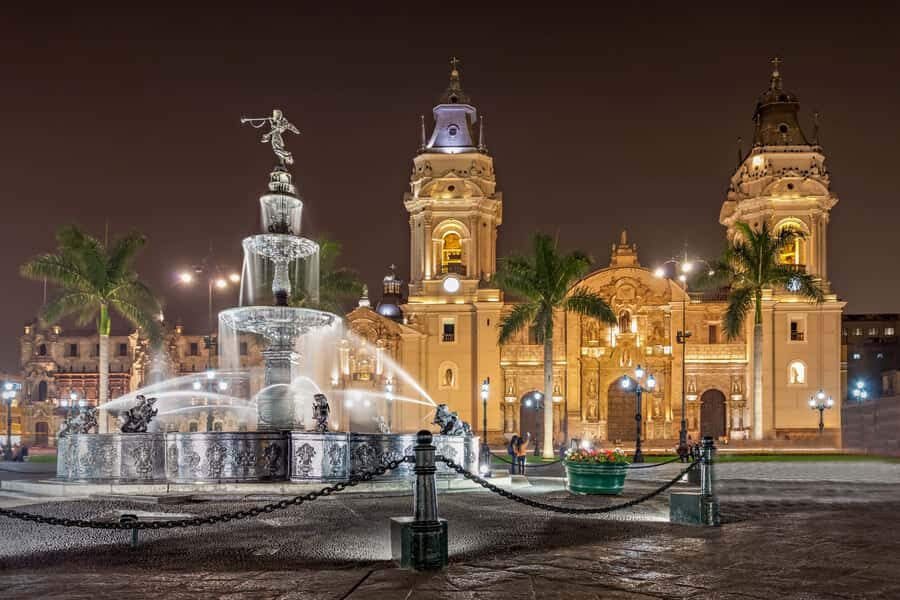 Lima: Water Magic Circuit, Downtown and Catacombs Night Tour - Downtown Lima after dark: Cathedral lighting and the Main Square