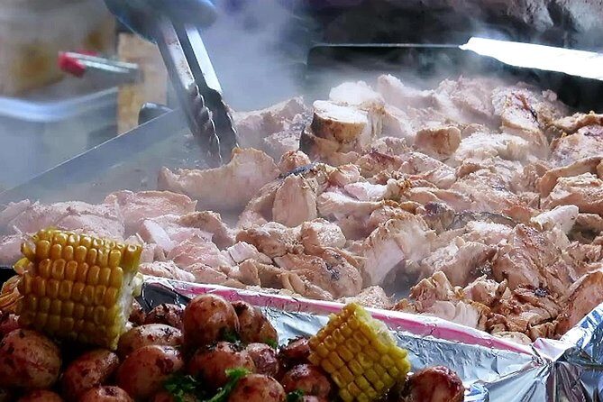 Private and exclusive Street Food and Peruvian History - Santiago de Surco Market: rainforest-inspired plates with Juanes de Pollo and Chaufa de Cecina